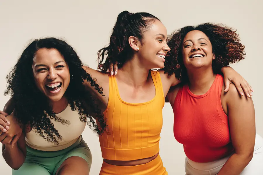 Weight-Loss-Counseling-Clinic A group of women laughing arm in arm. Get Weight Loss Counseling from Carolyn Zaumeyer, MSN, APRN in Fort Lauderdale.